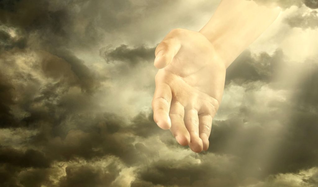 la divina providencia de Dios mostrada como una mano que desciende delcielo
